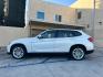 2014 WHITE /Black BMW X1 Leather (WBAVL1C56EV) with an 4 Cylinders engine, AUTOMATIC transmission, located at 30 S. Berkeley Avenue, Pasadena, CA, 91107, (626) 248-7567, 34.145447, -118.109398 - Don't let bad credit or financial setbacks hold you back from owning a luxury SUV like the 2014 BMW X1 xDrive28i. At our BHPH dealership, we're here to make the car-buying process as smooth and stress-free as possible. We invite you to visit our dealership in Pasadena, CA, to explore our inventory o - Photo#1